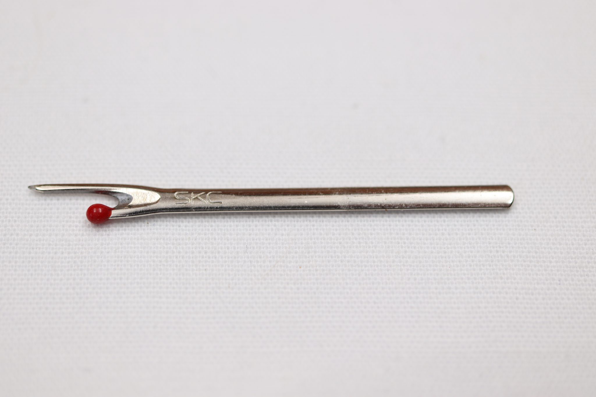 A Seam Ripper Replacement Blade for ripper with black "O" rings