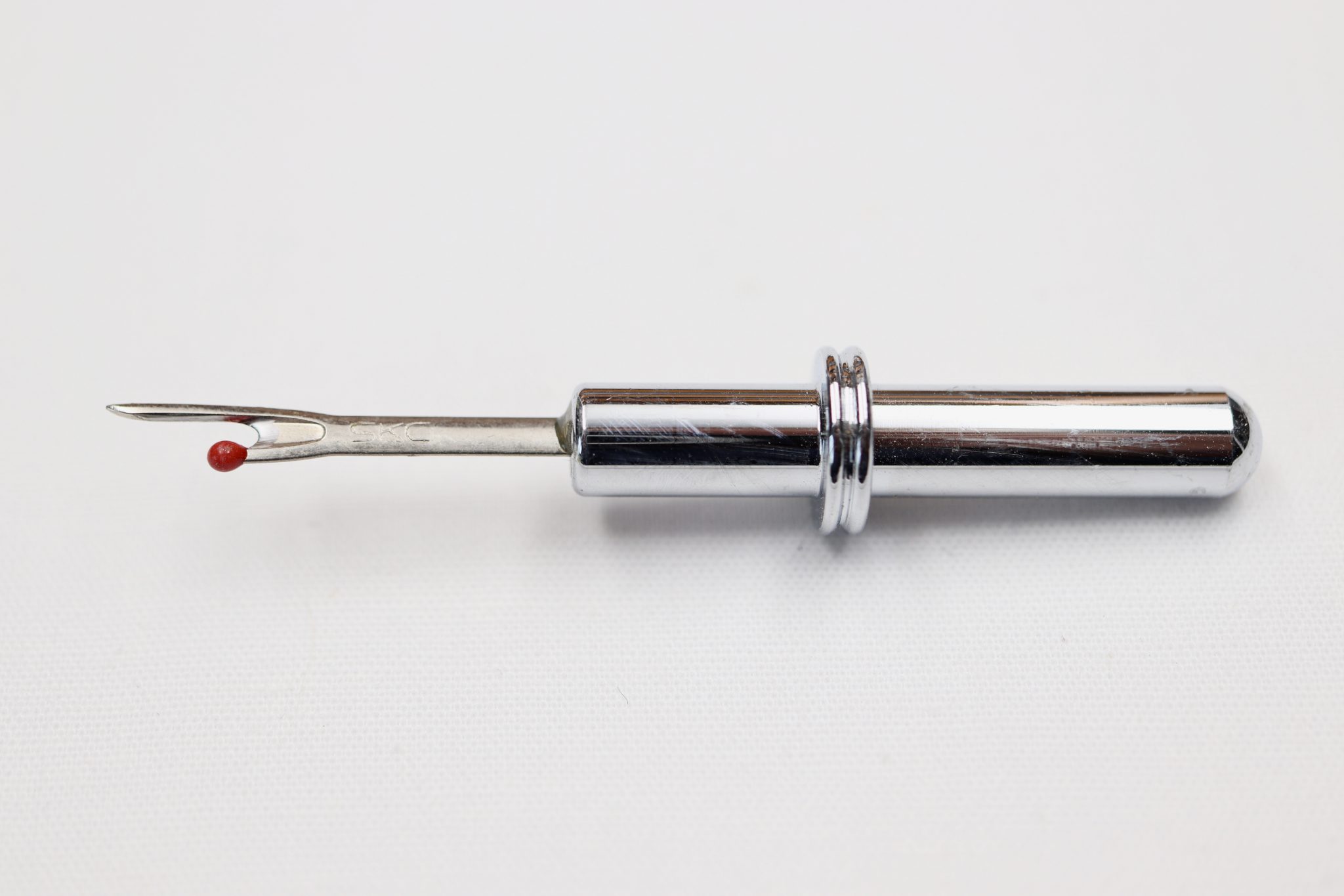 A Seam Ripper Replacement Blade for double ended chrome rippers